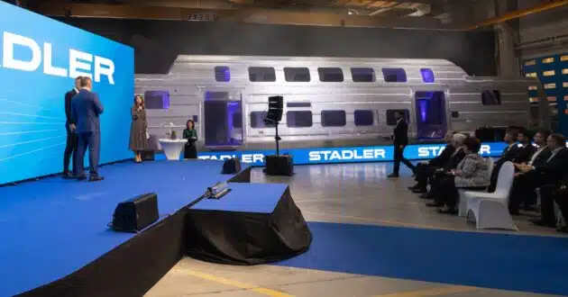 Picture of the celebration next to the newly manufactured body. © STADLER.