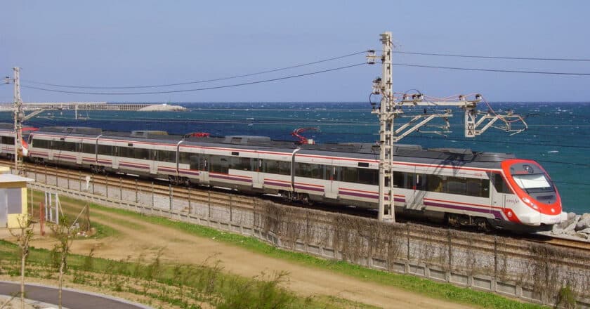 Rodalies train running through Mataró (CC BY SA) 1997-Wikimedia Commons. Cropped image.