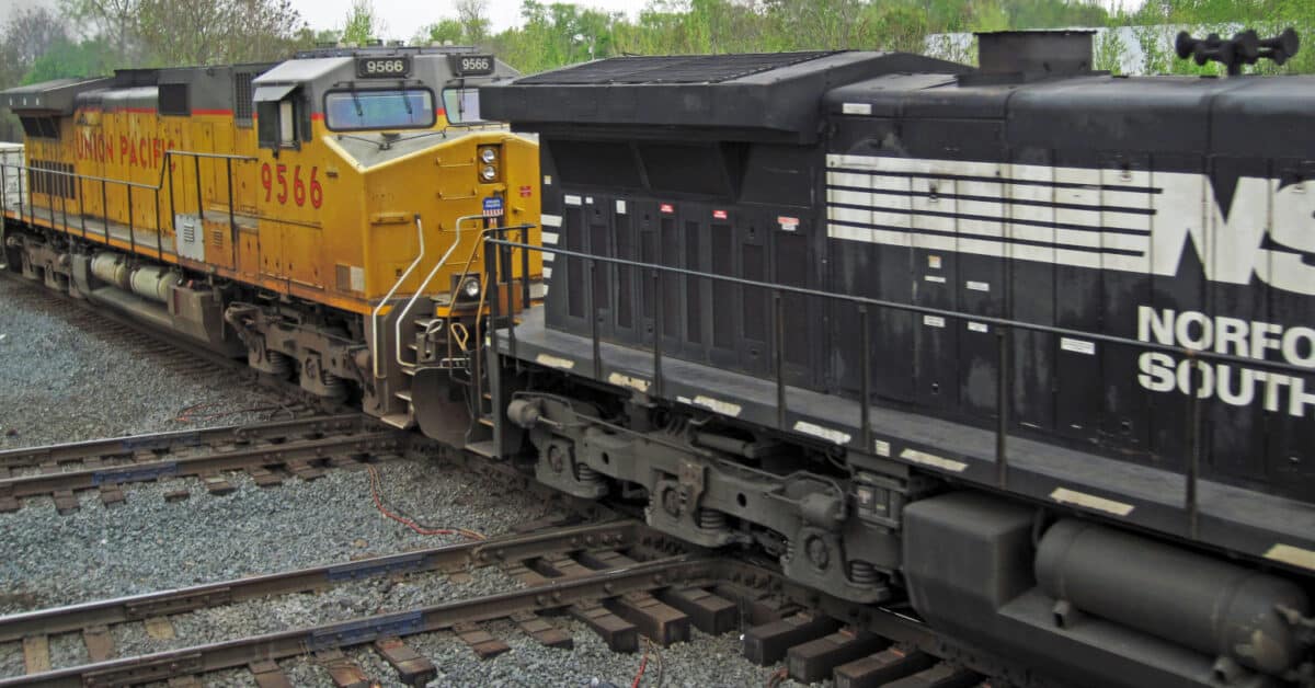 Norfolk Southern and Union Pacific locomotives towing a train in Marion, Ohio (CC BY SA) JAMES ST. JOHNS-Wikimedia Commons. Cropped image.