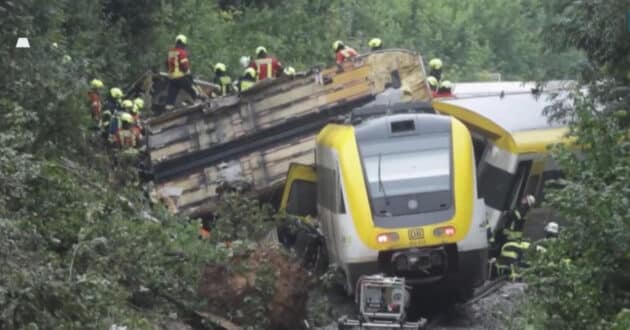 Emergency services working on the train after its derailment. AUTHORSHIP UNKNOWN.