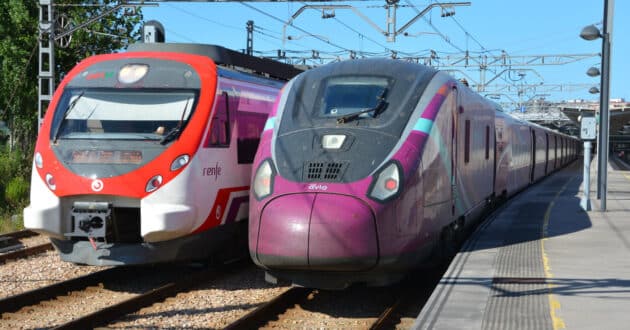 An Asturias Commuter Service Civia and an Avlo Class 106 in Gijón. © MIGUEL BUSTOS.